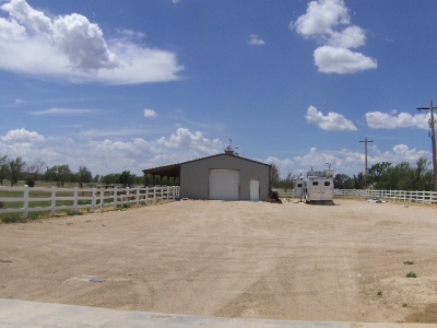 Option to purchase 6 acres plus barn ,pens,arena